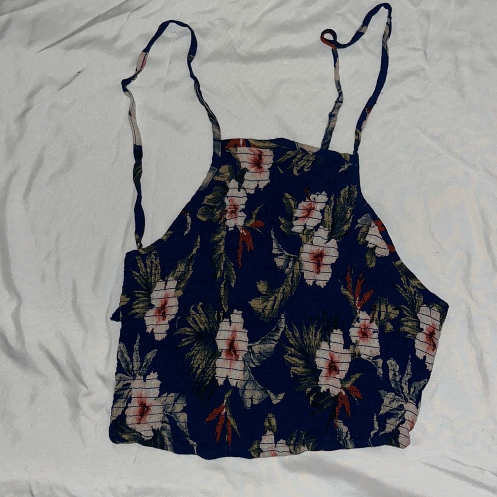 Cute elastic razor front that ties around neck and about back. Perfect condition